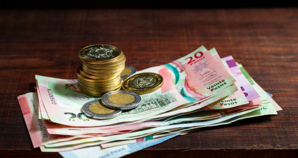 high angle banknotes coins arrangement